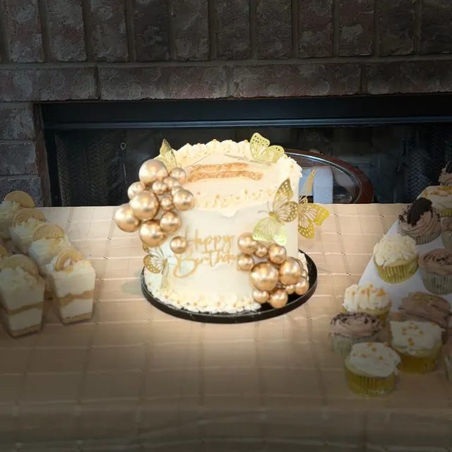 Gold butterfly celebration cake