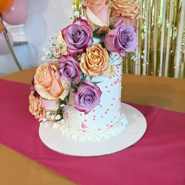 White cake with fresh roses